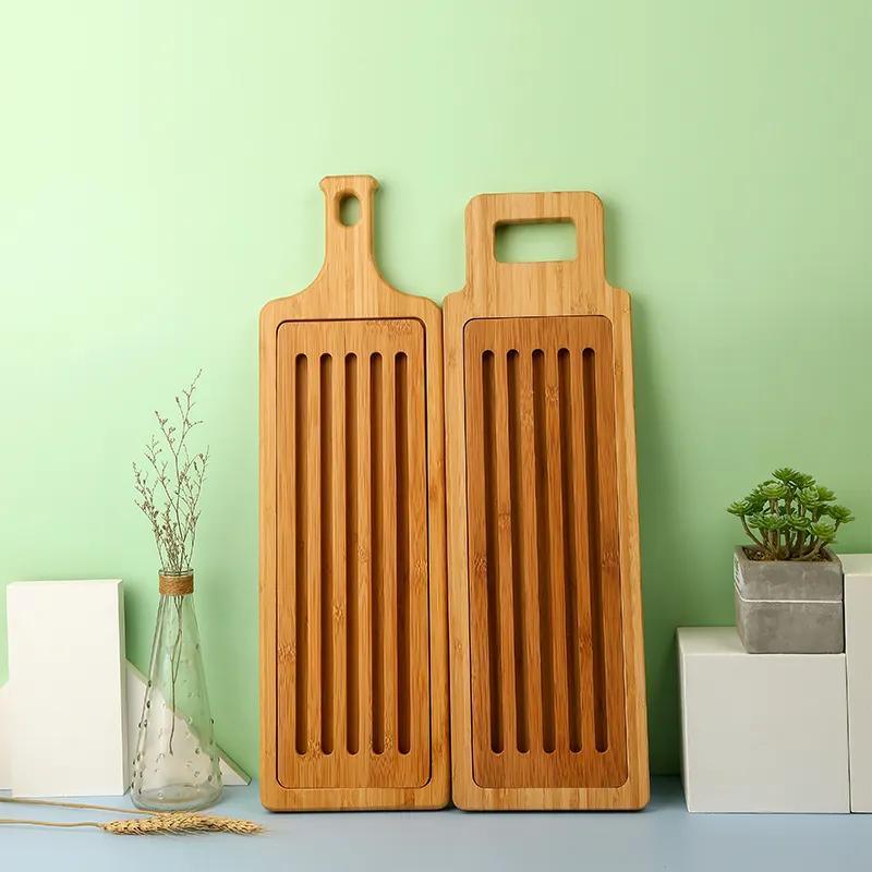 Long Strip Bamboo Bread Cutting Board with Handle and Slotted Bread Paddle Serving Board with Crumb Catcher Grid