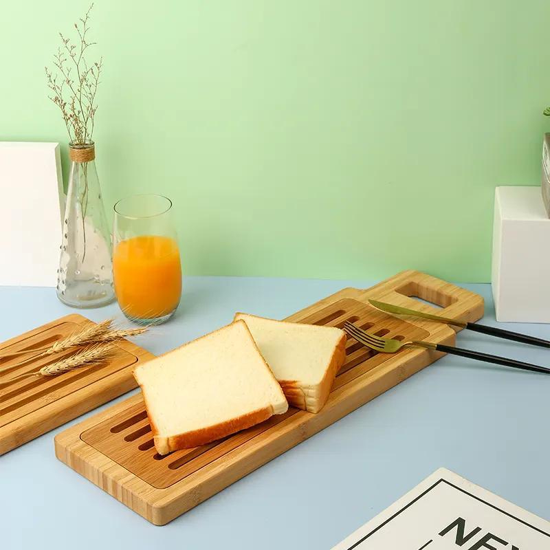 Long Strip Bamboo Bread Cutting Board with Handle and Slotted Bread Paddle Serving Board with Crumb Catcher Grid